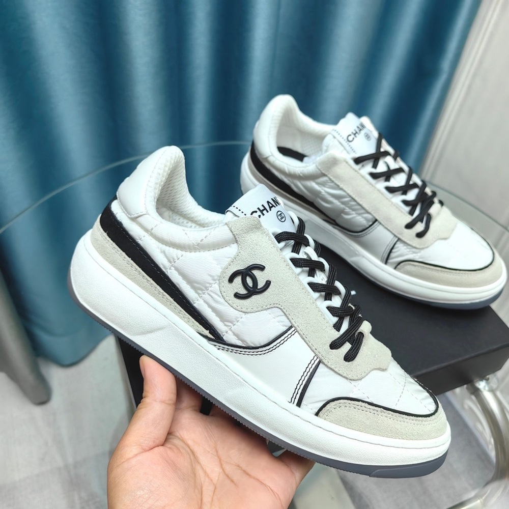 CHANEL Women’s Black and White Casual Sneakers - Picture 3 of 9